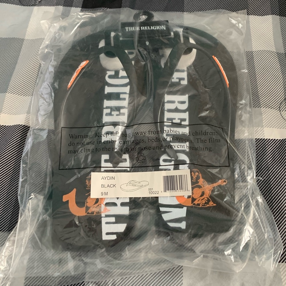 True Religion Black, White, and Orange Men’s Flip Flops
